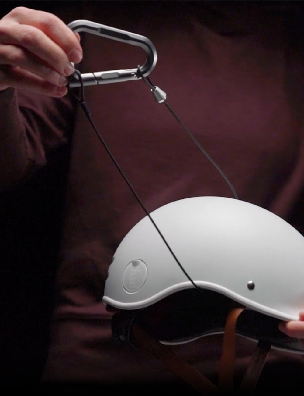 betalock and cable wrapped around bike helmet