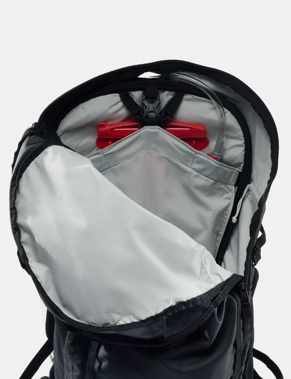 black backpack open to show interior
