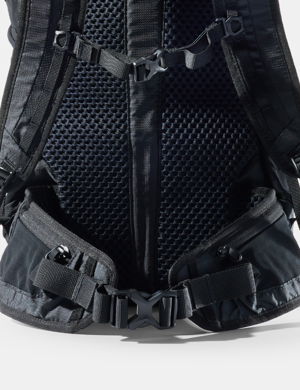black backpack&#39;s zippered hip belts
