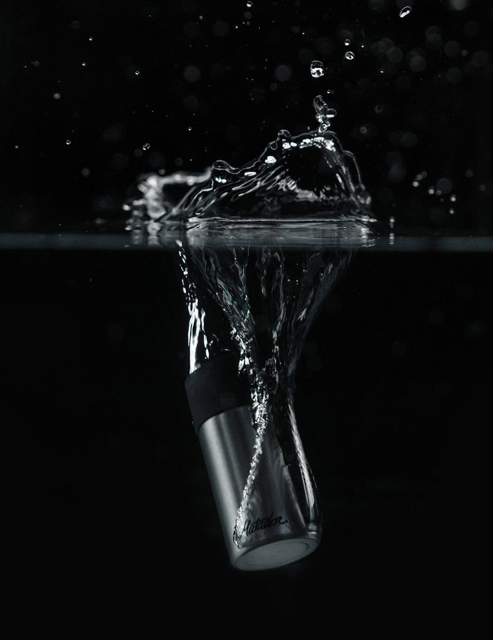 small canister fully submerged in water