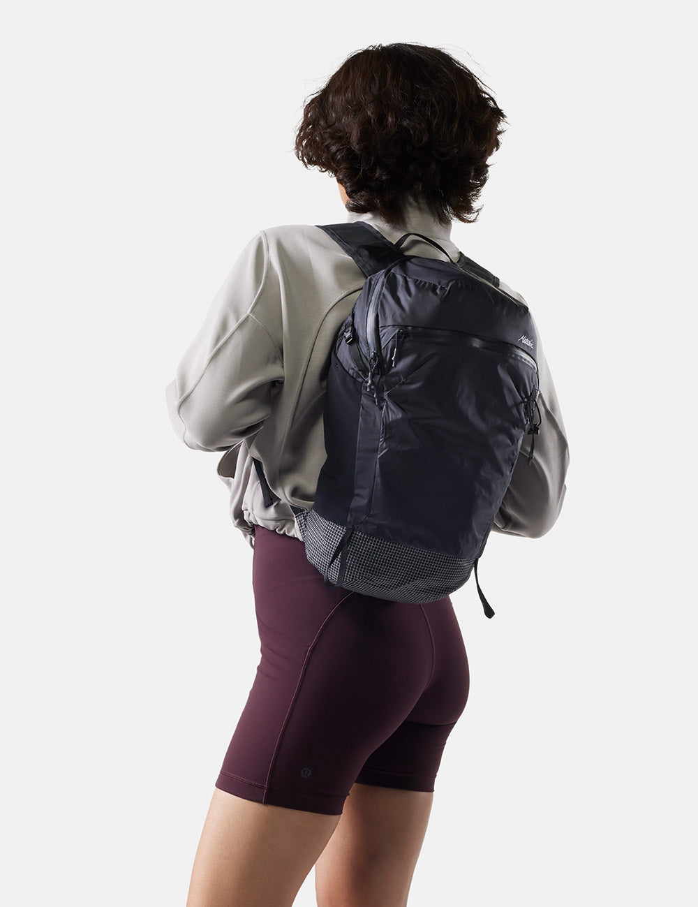 woman wearing black backpack