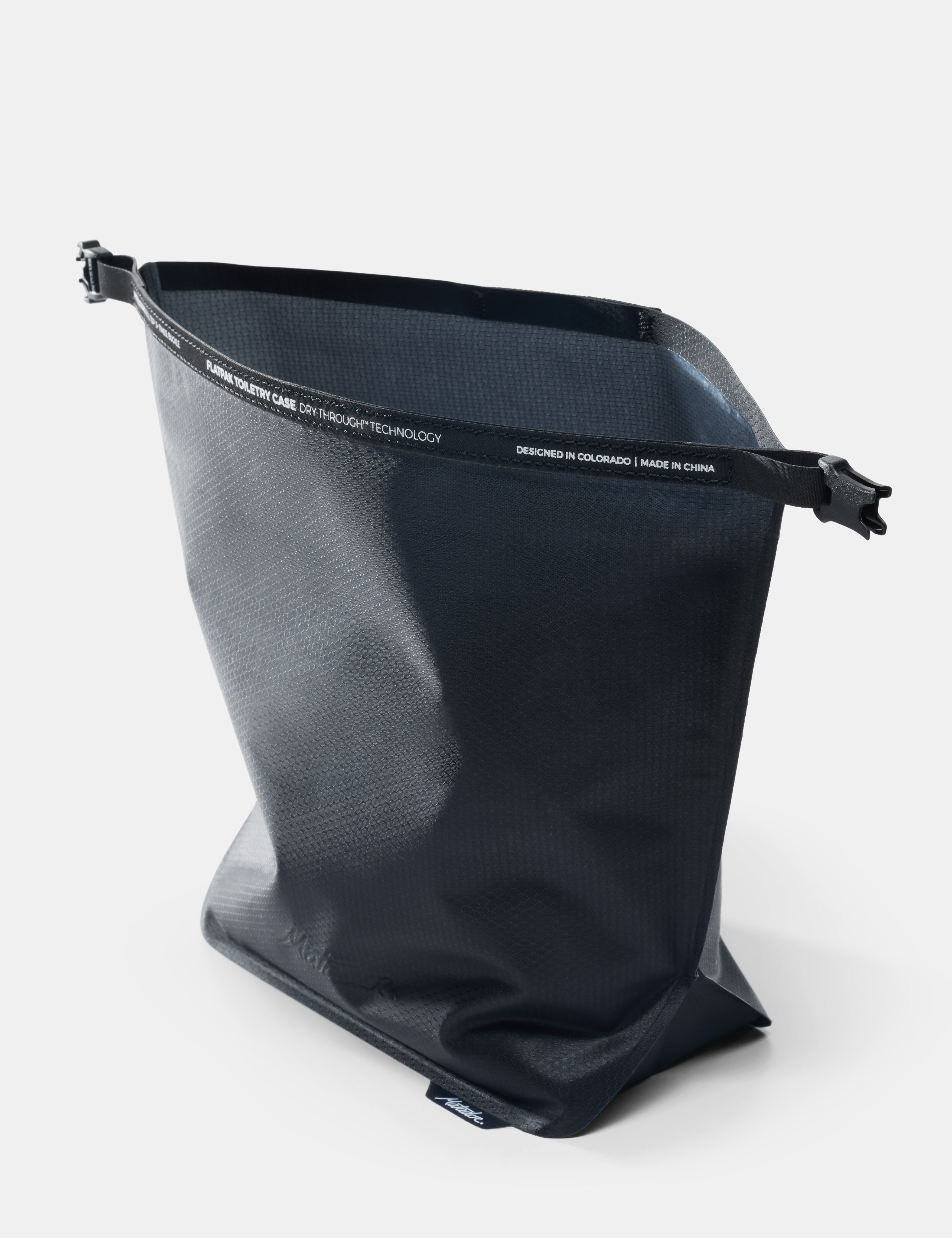 Black toiletry case on a white background