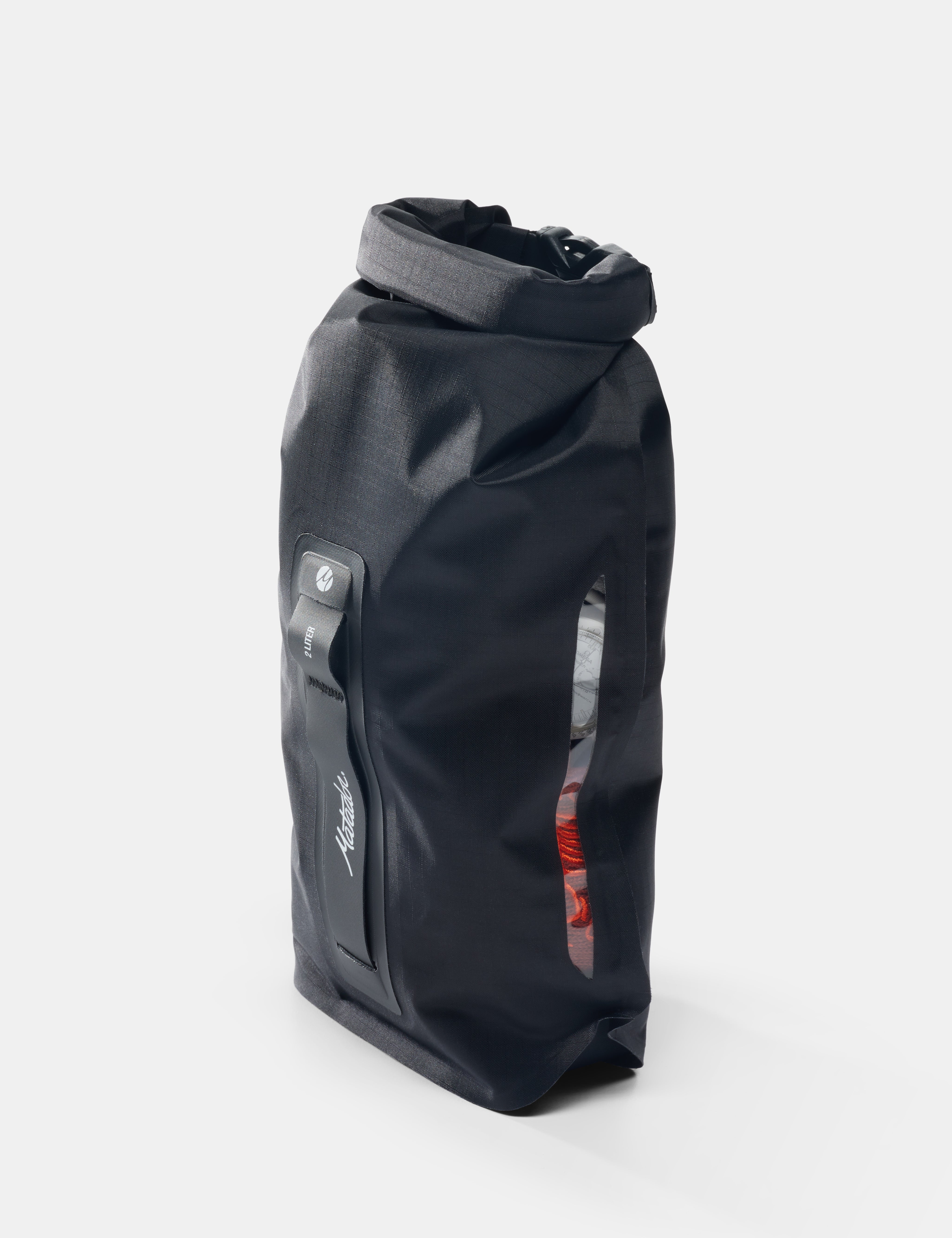 Black waterproof bag on a white background