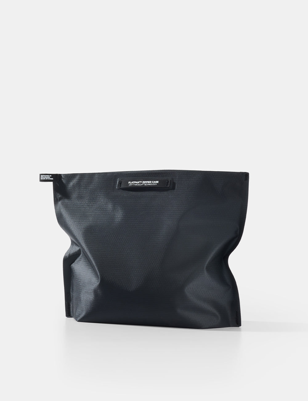 Black pouch with a brand label on a white background