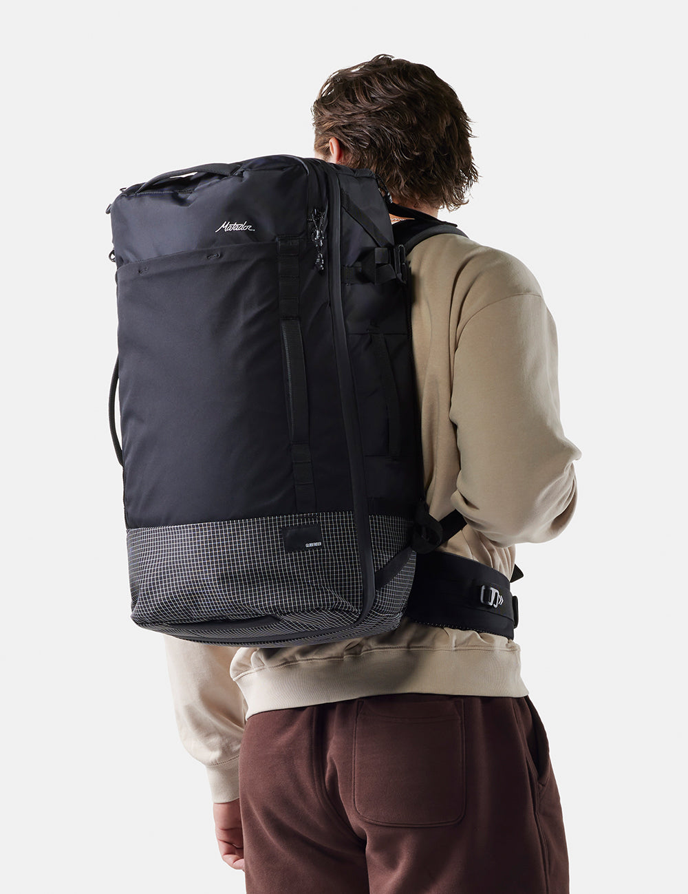 man wearing black backpack