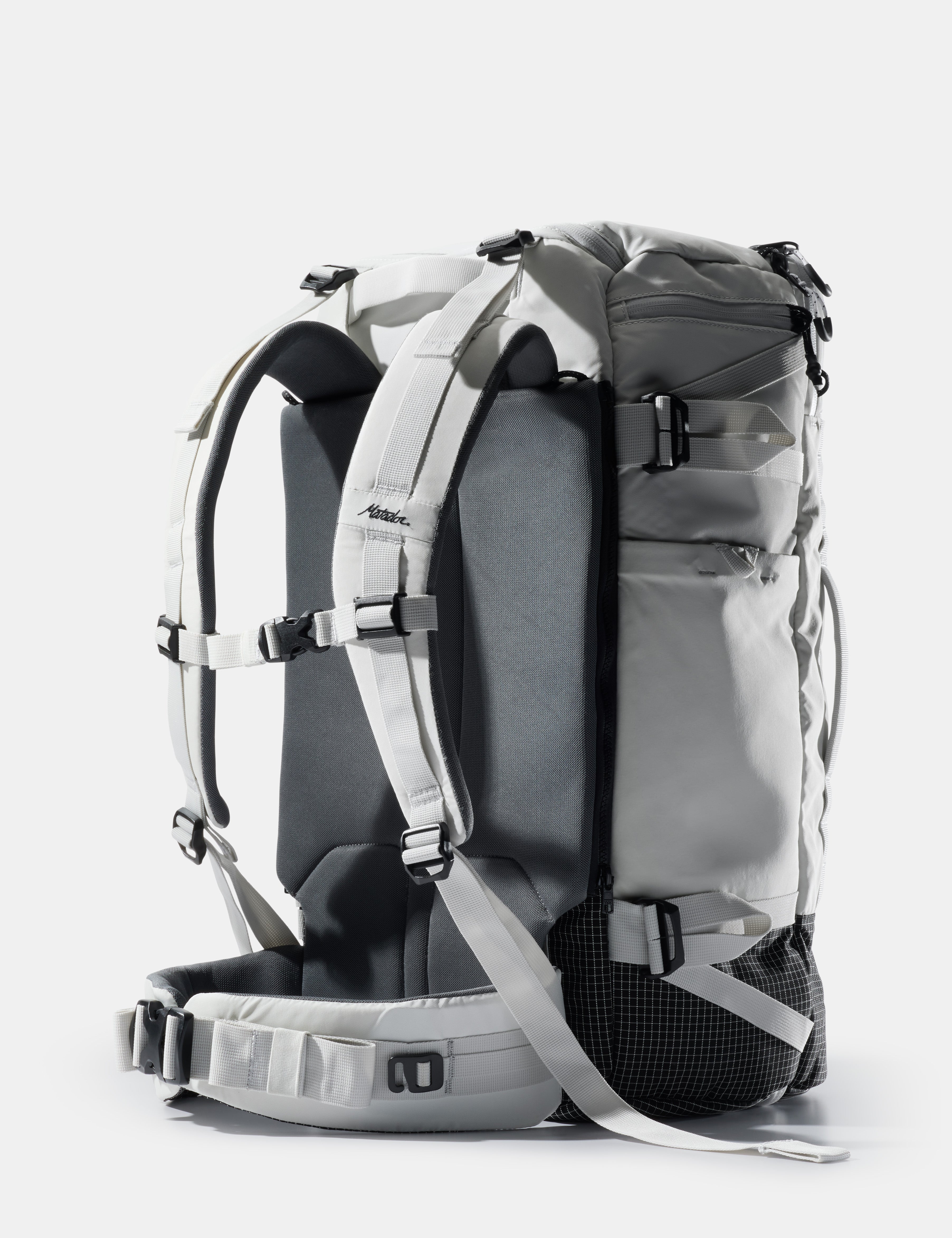 Gray backpack with multiple straps on a white background