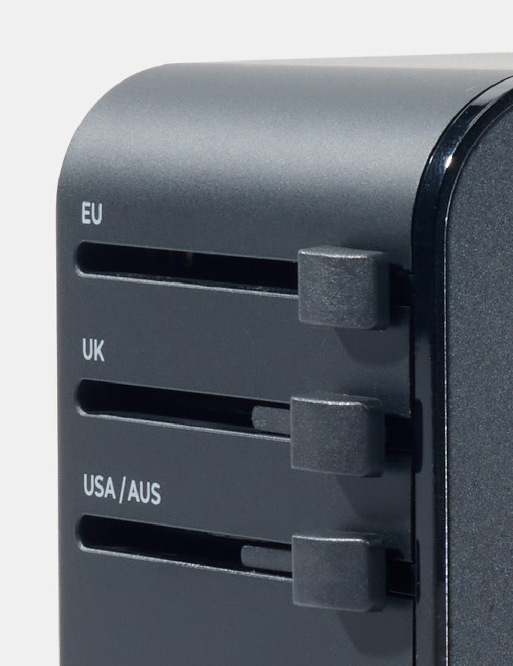 Close up view of country sliders on travel adapter