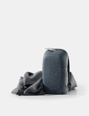 Nanodry towel placed next to silicone case on white background