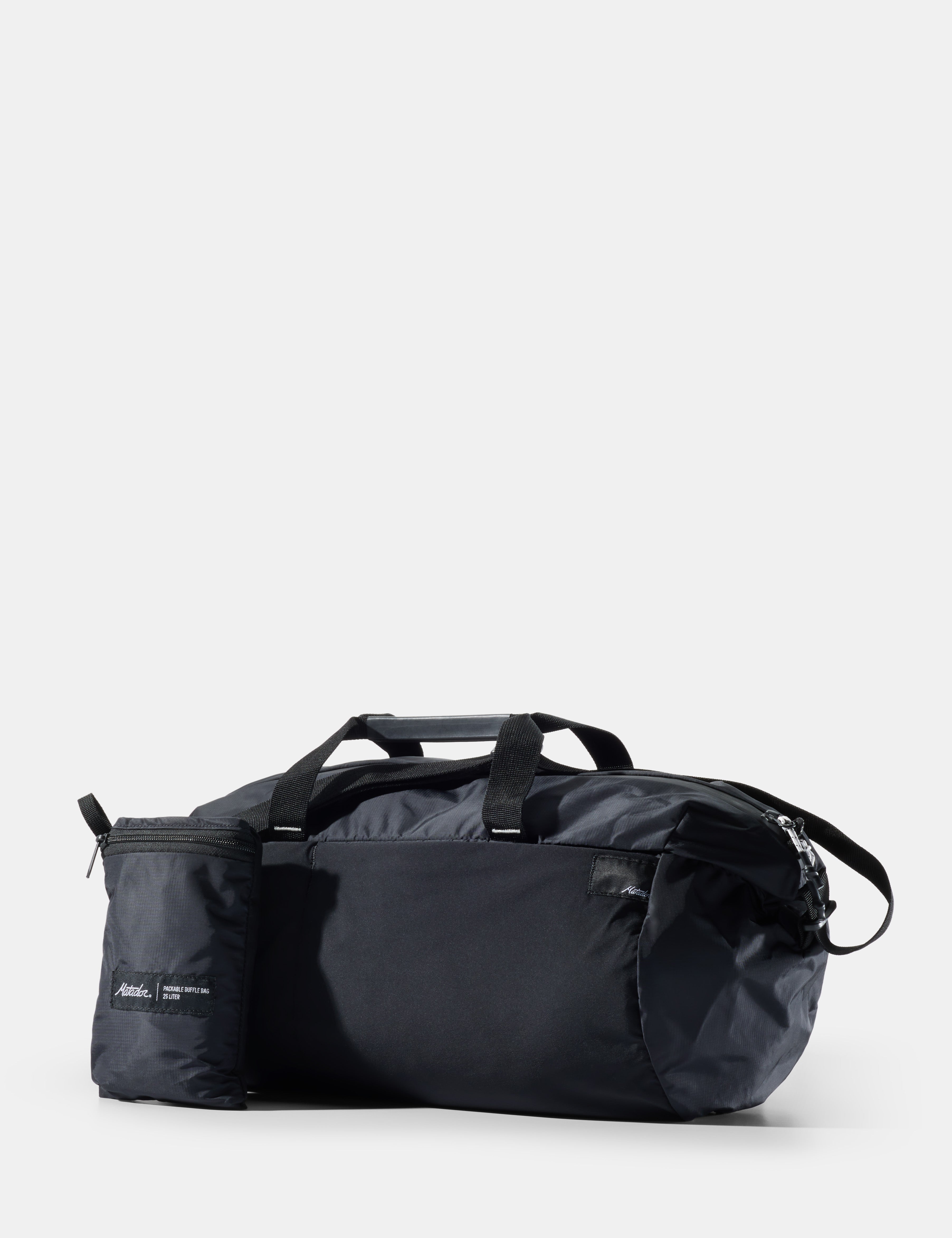 Black duffel bag on a white background