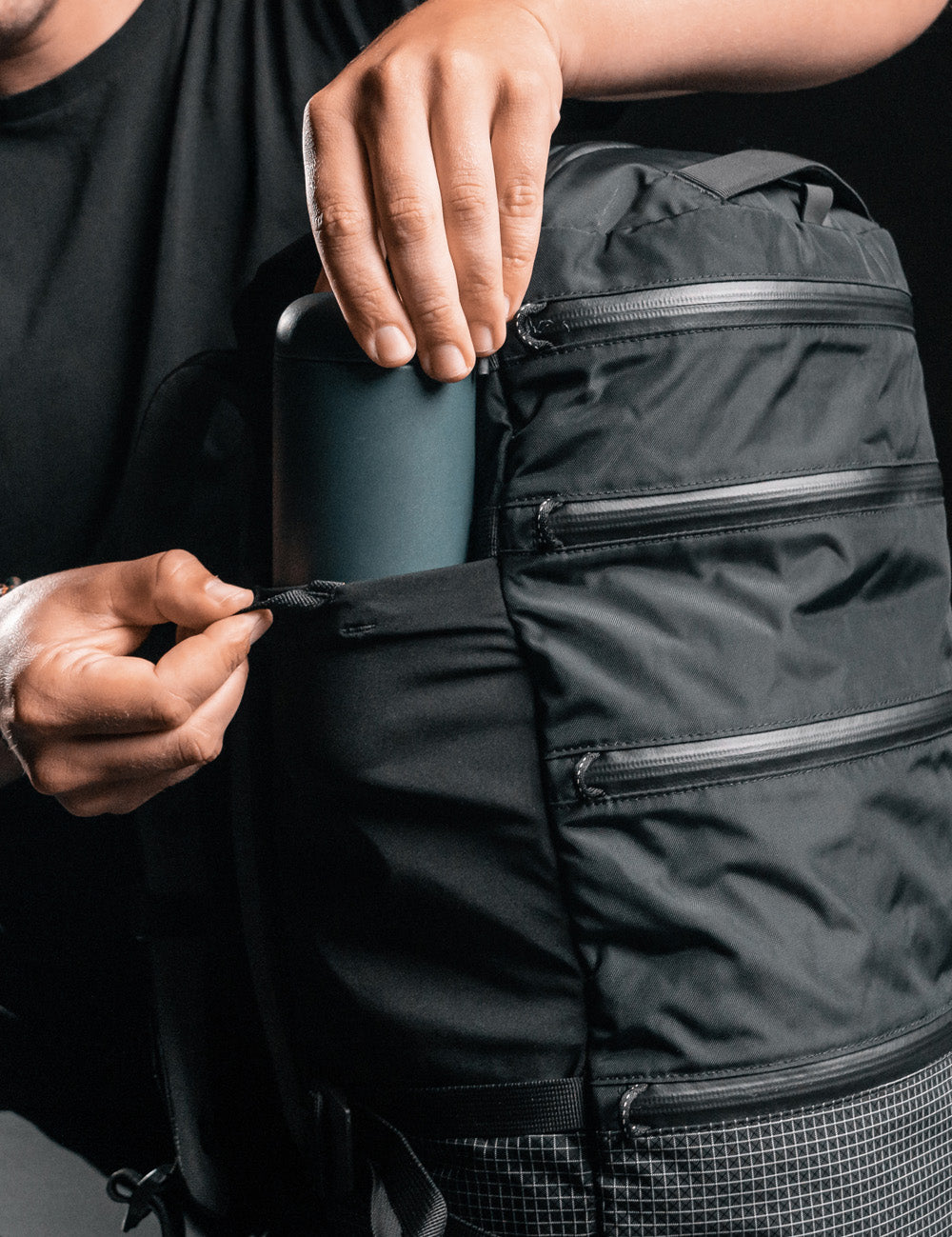 pulling water bottle out of SEG28 pocket