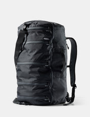 Black backpack on a light gray background