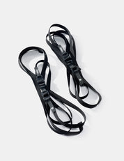 Black straps on a white background