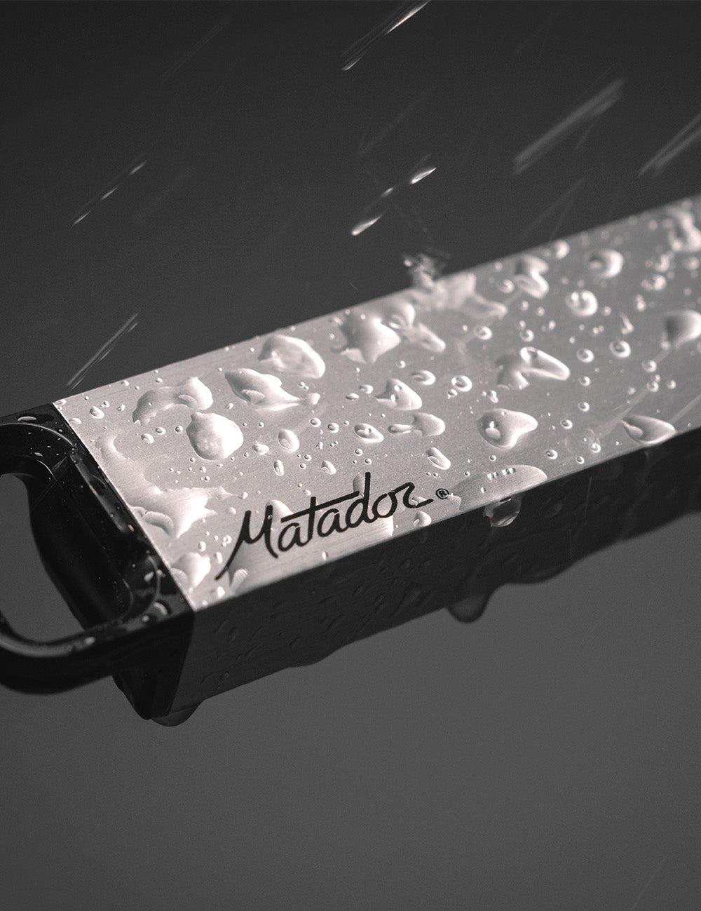 pill canister with water beading off of it