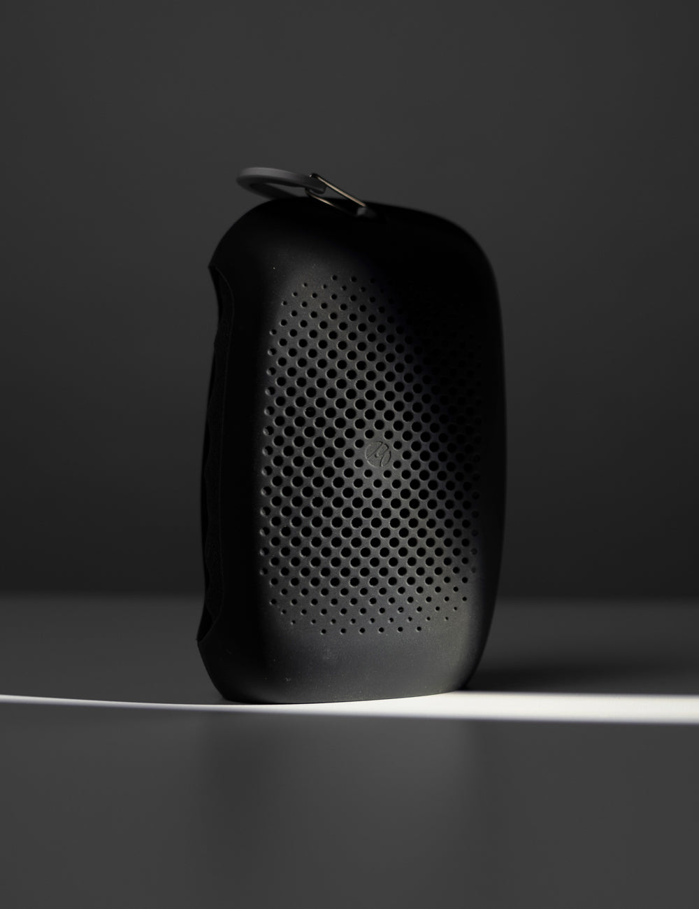 silicone towel case in moody lit background