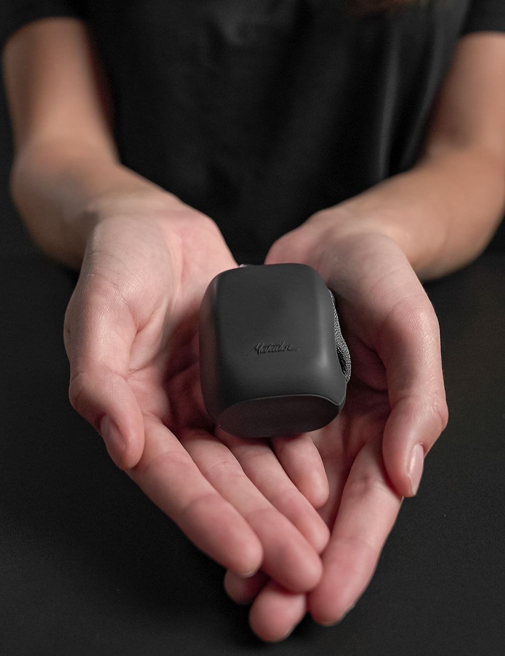 hands holding out trek towel case