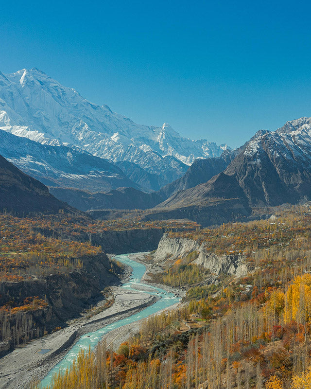 Mountains and river flowing through Hunza Valley, Pakistan in Autumn