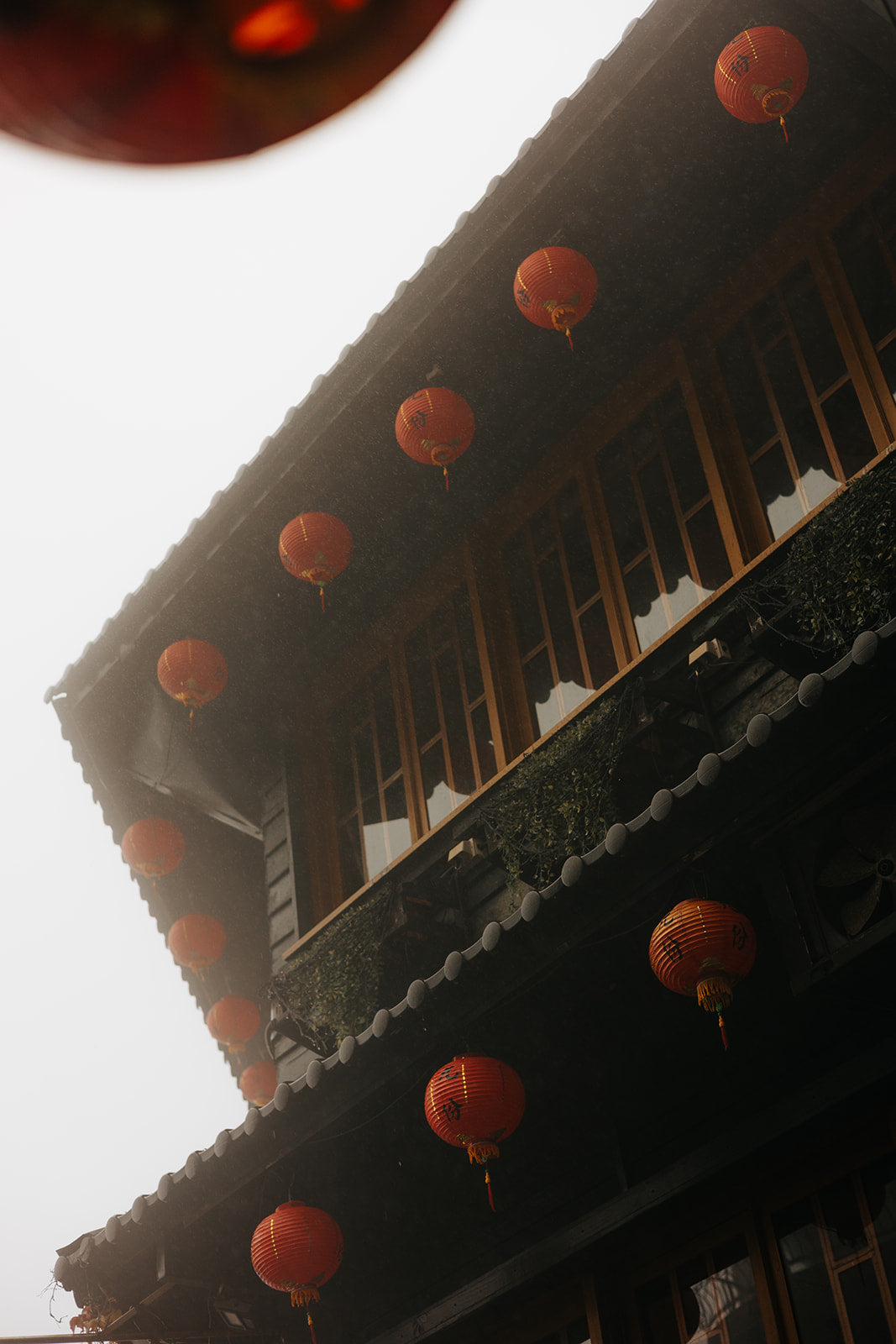 a teahouse in taiwan with red paper lanterns